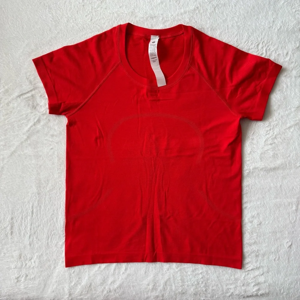 Swiftly Tech Short-Sleeve Shirt 2.0 *Waist Length Hot Heat/Hot Heat